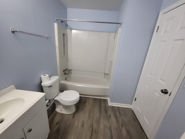 full bathroom with hardwood / wood-style flooring, vanity, toilet, and bathing tub / shower combination