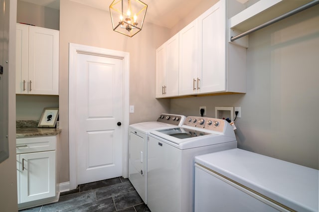 1976 Liberia Rd, Wadmalaw Island, SC 29487 - clothes washing area with cabinet space, separate washer and dryer, and a chandelier