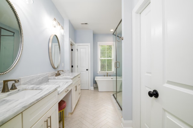 1976 Liberia Rd, Wadmalaw Island, SC 29487 - full bath featuring double vanity, a soaking tub, a stall shower, and recessed lighting