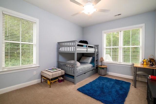 1976 Liberia Rd, Wadmalaw Island, SC 29487 - carpeted bedroom with baseboards and a ceiling fan
