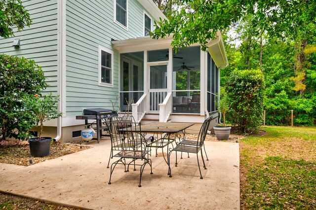 1976 Liberia Rd, Wadmalaw Island, SC 29487 - view of patio / terrace with a sunroom, a ceiling fan, and a grill