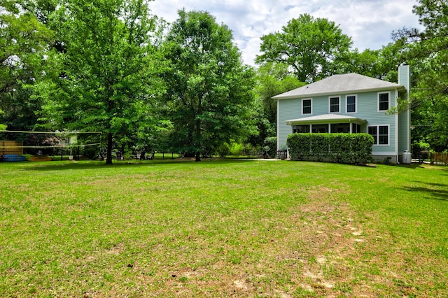 1976 Liberia Rd, Wadmalaw Island, SC 29487 - view of grassy yard with view of wooded area