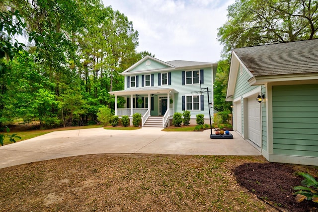 1976 Liberia Rd, Wadmalaw Island, SC 29487 - view of front of home with a porch and a garage
