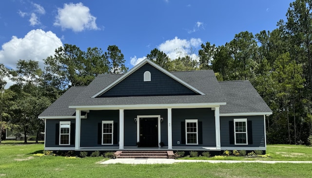 view of front of home featuring a porch and a front lawn