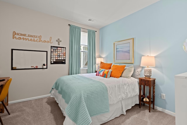 bedroom featuring visible vents, baseboards, and carpet floors