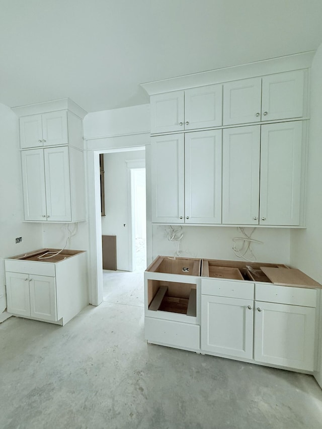 kitchen with white cabinets