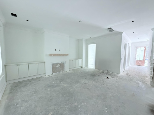 unfurnished living room with crown molding