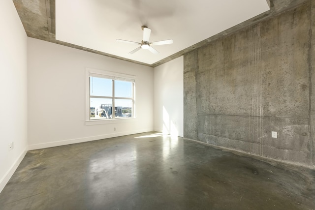 spare room featuring ceiling fan