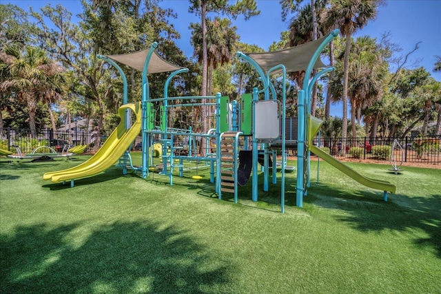 view of jungle gym with a lawn