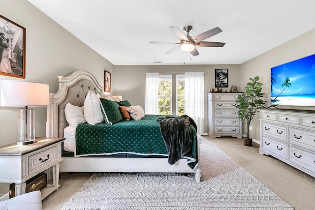 9829 English Elm St, Ladson, SC 29456 - bedroom with light carpet, a ceiling fan, and baseboards