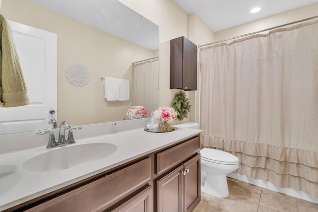 9829 English Elm St, Ladson, SC 29456 - bathroom featuring tile patterned flooring, toilet, vanity, and a shower with shower curtain