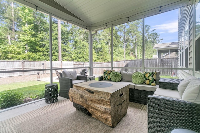 9829 English Elm St, Ladson, SC 29456 - sunroom / solarium with an outdoor hangout area, vaulted ceiling, and view of wooded area