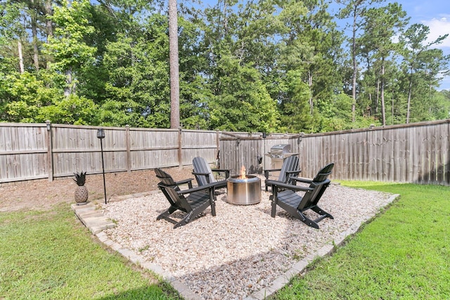9829 English Elm St, Ladson, SC 29456 - view of yard with a fire pit