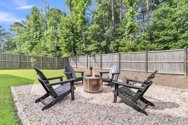 9829 English Elm St, Ladson, SC 29456 - view of yard featuring an outdoor fire pit