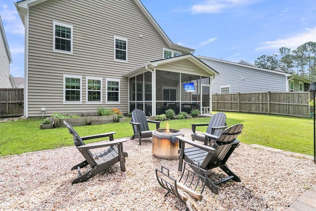 9829 English Elm St, Ladson, SC 29456 - back of house featuring a fire pit and a sunroom