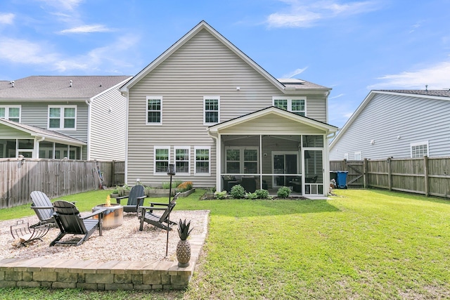 9829 English Elm St, Ladson, SC 29456 - rear view of house with a fire pit, a sunroom, and a patio