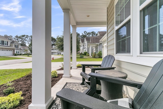 9829 English Elm St, Ladson, SC 29456 - covered porch featuring a residential view