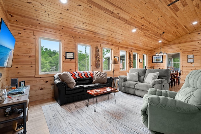 5653 Wire Rd, Branchville, SC 29432 - living room with wooden walls, wood ceiling, light wood finished floors, lofted ceiling, and recessed lighting