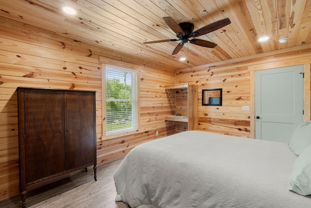 5653 Wire Rd, Branchville, SC 29432 - bedroom with wood ceiling, light wood-style floors, wooden walls, and recessed lighting