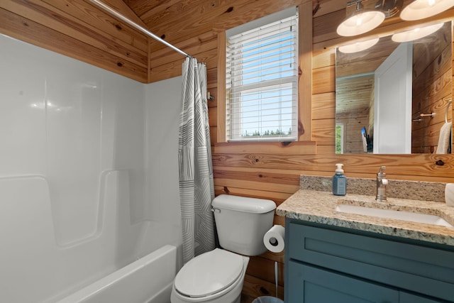 5653 Wire Rd, Branchville, SC 29432 - bathroom featuring wooden walls, shower / bath combo with shower curtain, toilet, and vanity