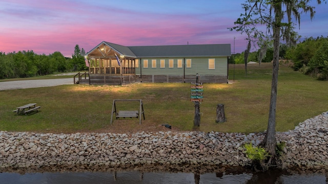 5653 Wire Rd, Branchville, SC 29432 - exterior space featuring metal roof, a yard, and a water view