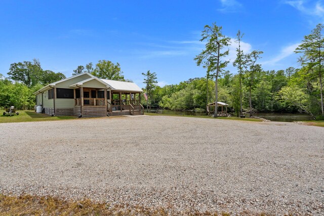 5653 Wire Rd, Branchville, SC 29432 - view of front of home with a porch and gravel driveway