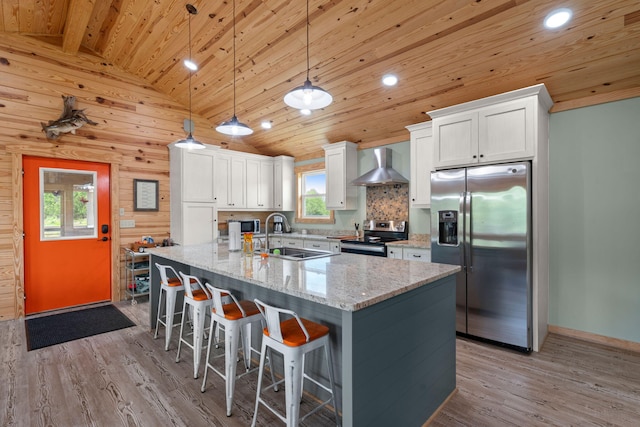5653 Wire Rd, Branchville, SC 29432 - kitchen featuring vaulted ceiling, a sink, stainless steel appliances, wooden ceiling, and wall chimney exhaust hood