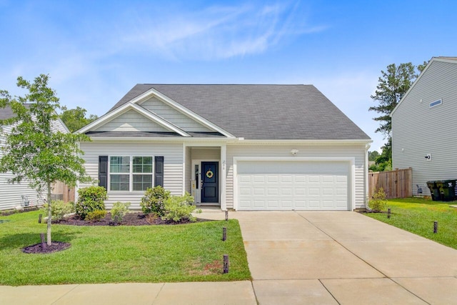 266 Torslanda Ln, Summerville, SC 29486 - view of front of home featuring an attached garage, concrete driveway, and a shingled roof