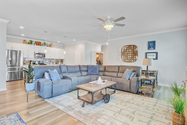 266 Torslanda Ln, Summerville, SC 29486 - living room with ceiling fan, recessed lighting, light wood-style floors, ornamental molding, and baseboards
