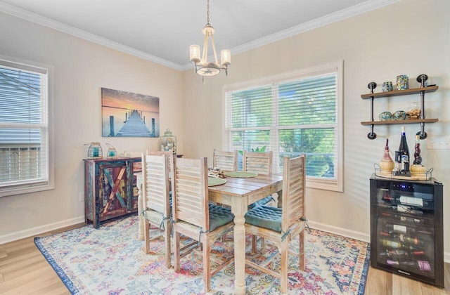 266 Torslanda Ln, Summerville, SC 29486 - dining space with a chandelier, wood finished floors, baseboards, and ornamental molding