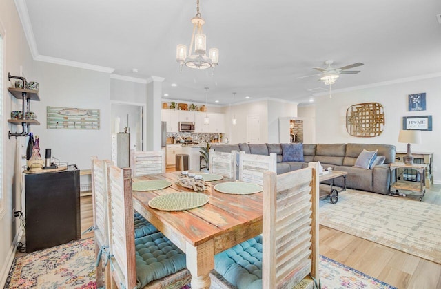 266 Torslanda Ln, Summerville, SC 29486 - dining room featuring ceiling fan, crown molding, light wood-type flooring, a chandelier, and recessed lighting