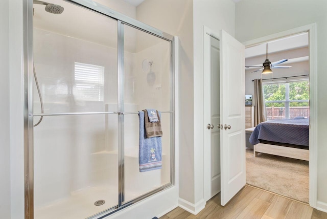 266 Torslanda Ln, Summerville, SC 29486 - ensuite bathroom featuring a stall shower, wood finished floors, and a ceiling fan