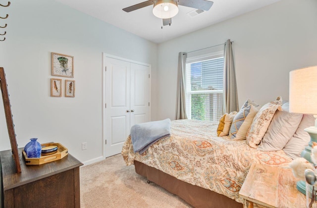 266 Torslanda Ln, Summerville, SC 29486 - bedroom with light carpet, a closet, a ceiling fan, and baseboards