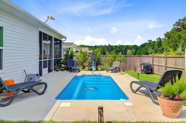 266 Torslanda Ln, Summerville, SC 29486 - view of swimming pool featuring a patio, a fenced backyard, and a sunroom
