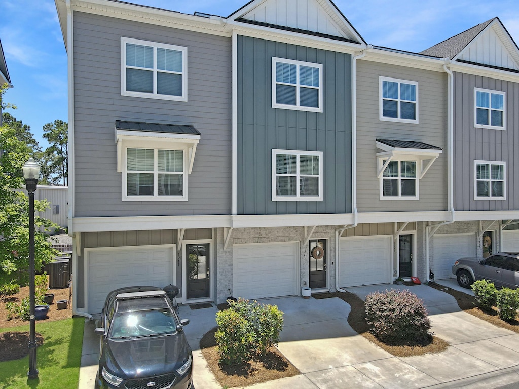 view of property featuring central AC unit