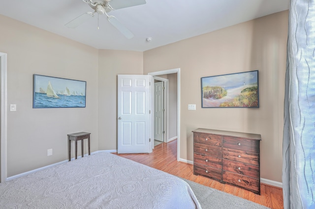 bedroom featuring ceiling fan and light hardwood / wood-style floors