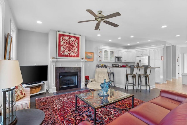 living room featuring ceiling fan