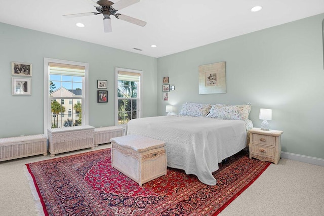 carpeted bedroom featuring ceiling fan