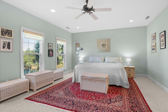 carpeted bedroom featuring ceiling fan