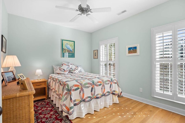 bedroom featuring wood-type flooring and ceiling fan