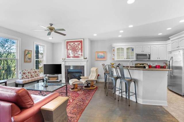 living room with ceiling fan