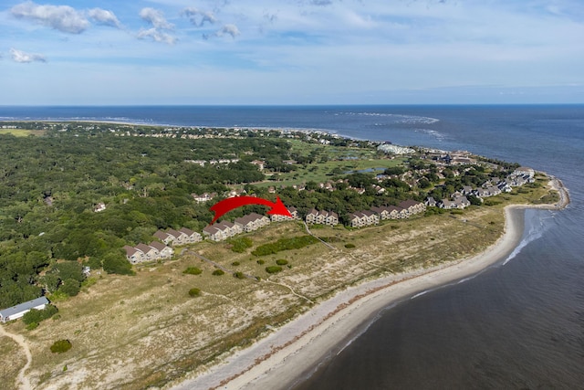 aerial view with a water view and a beach view