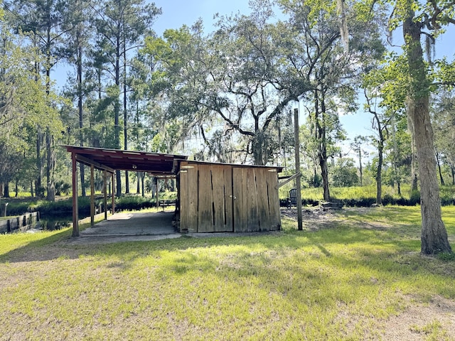 4589 Prices Bridge Ln, Walterboro, SC 29488 - view of outbuilding featuring a carport
