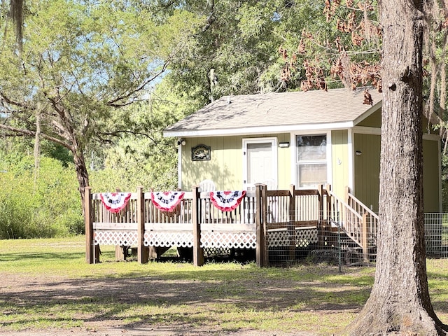4589 Prices Bridge Ln, Walterboro, SC 29488 - view of front facade with a shingled roof and a wooden deck