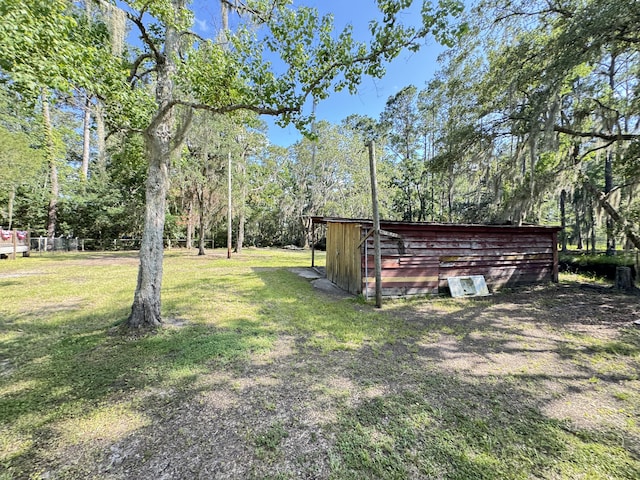 4589 Prices Bridge Ln, Walterboro, SC 29488 - view of green lawn with an outbuilding