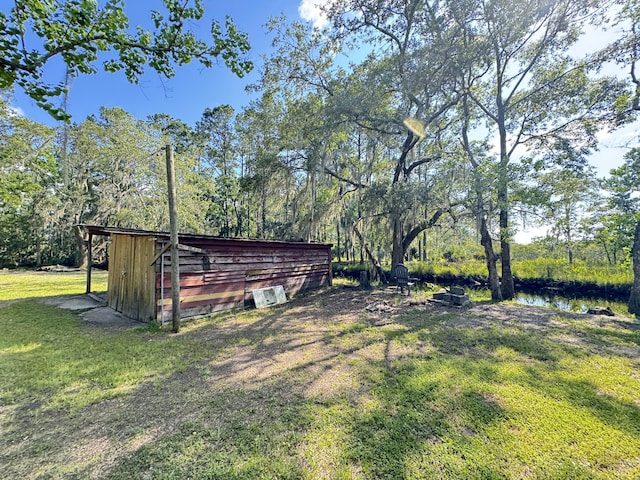 4589 Prices Bridge Ln, Walterboro, SC 29488 - view of green lawn featuring an outdoor structure and an outbuilding
