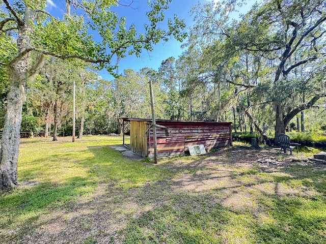4589 Prices Bridge Ln, Walterboro, SC 29488 - view of green lawn with an outdoor structure