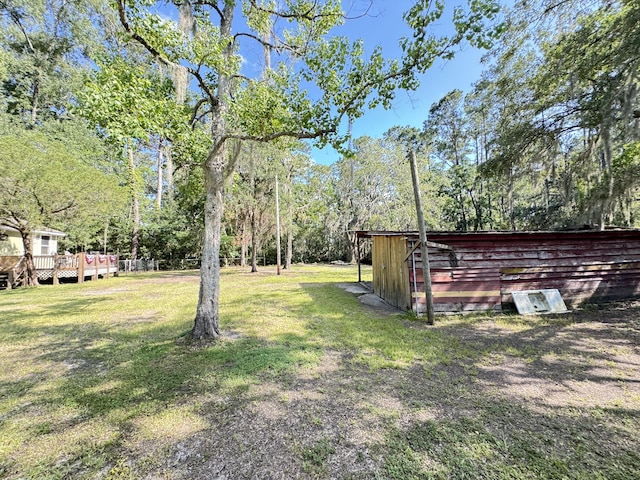 4589 Prices Bridge Ln, Walterboro, SC 29488 - view of grassy yard with a wooden deck