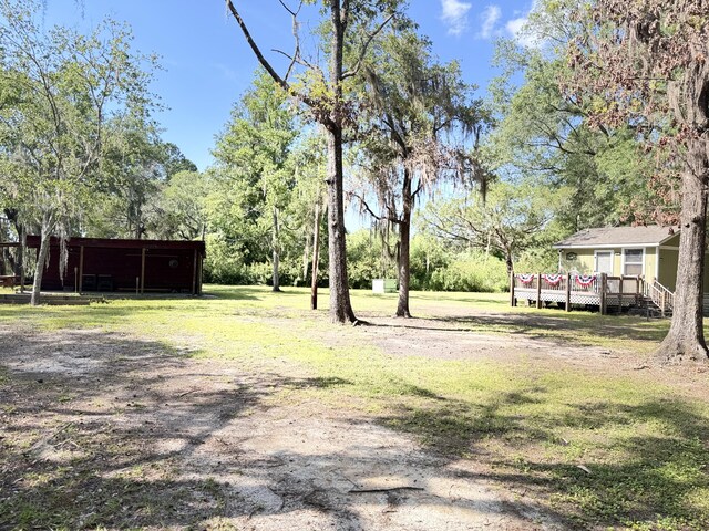 4589 Prices Bridge Ln, Walterboro, SC 29488 - view of grassy yard featuring a wooden deck