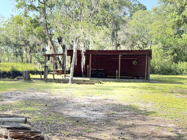 4589 Prices Bridge Ln, Walterboro, SC 29488 - view of pole building with a lawn